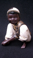 petit noir joueur de bille